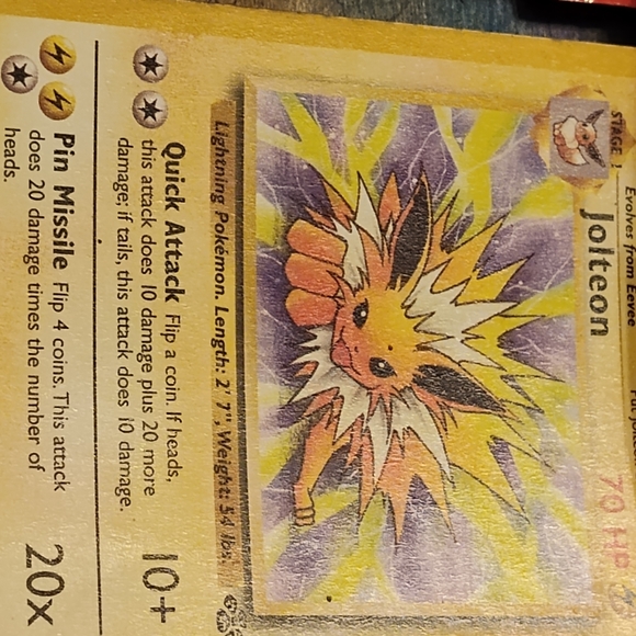 Lot of 11 first edition Pokemon cards with a black star pikachu